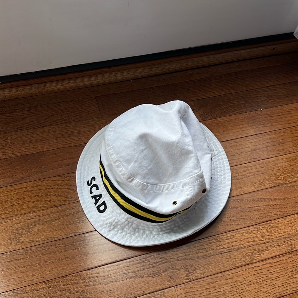 SCAD bucket hat in white and black and yellow